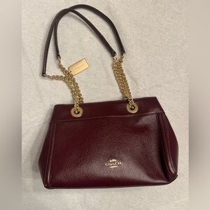 Never used burgundy COACH bag